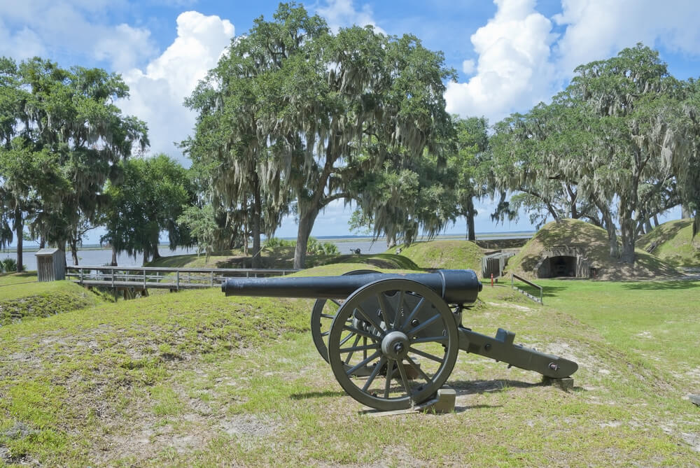 A cannon on the grounds of Fort McAllister State Park, one of the top things to do and see in Richmond Hill, GA.