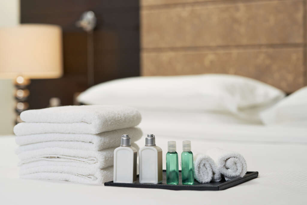 Stock fresh towels and linen and toiletries like soap and shampoo in the bathroom.