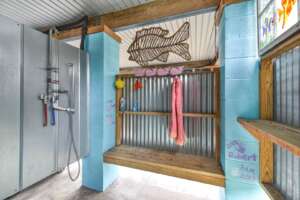 An outdoor shower at a Tybee Island vacation rental to rinse off in after visiting the beaches.
